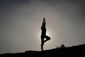Woman doing yoga outside