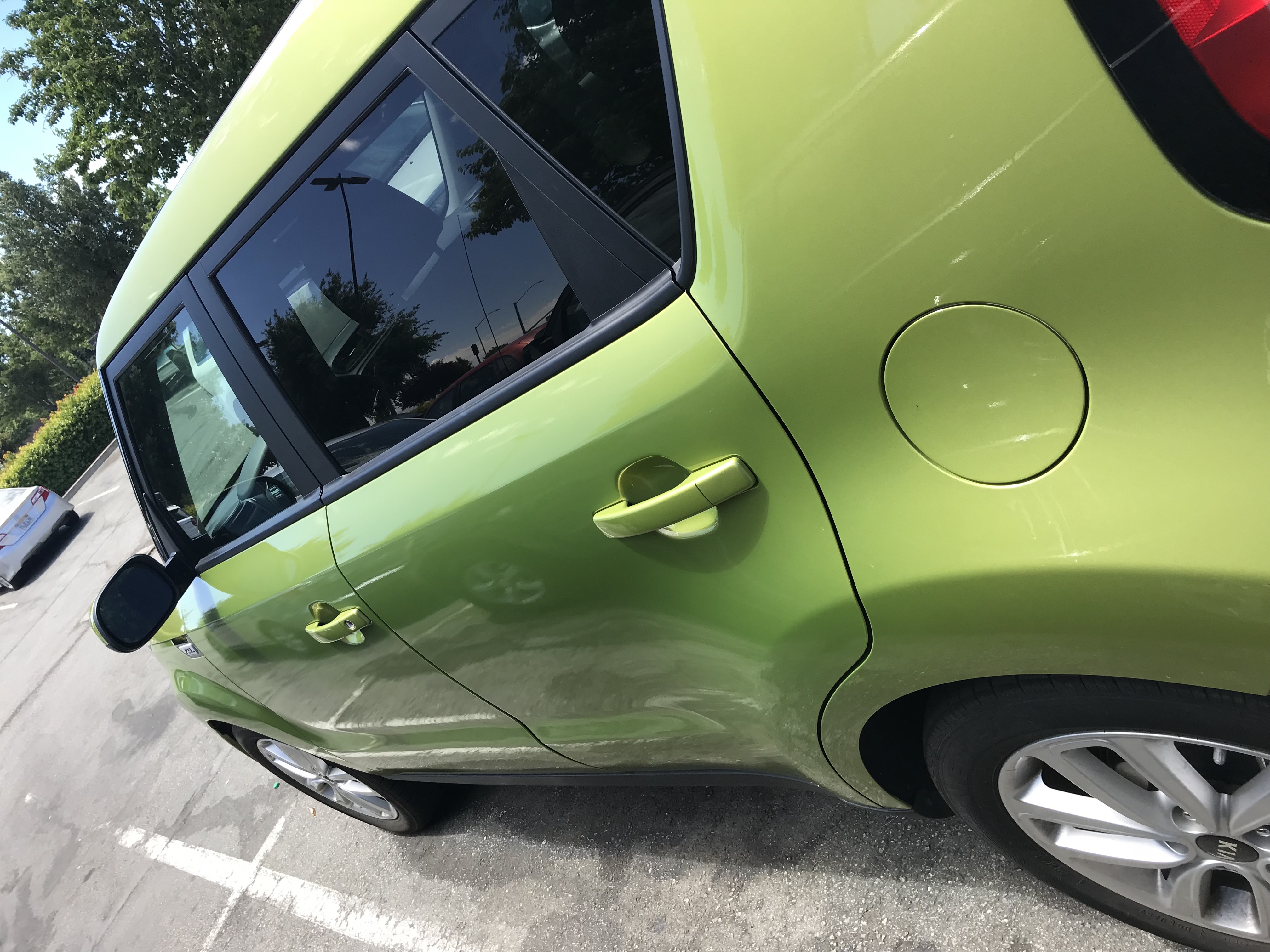Cute Green Rental Car made me smile by Denise M. Colby