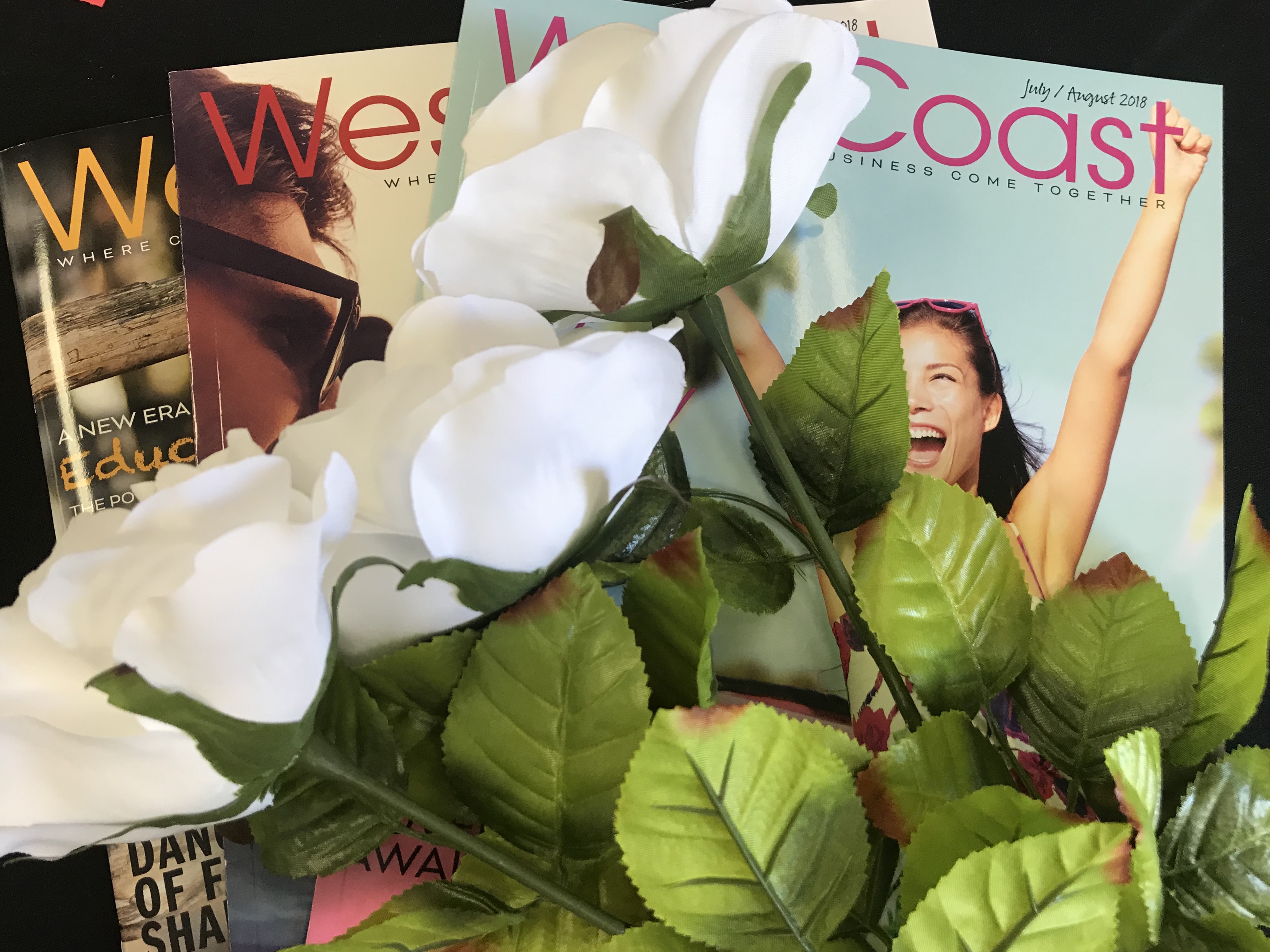 Three white roses for three magazine articles - Denise M. Colby