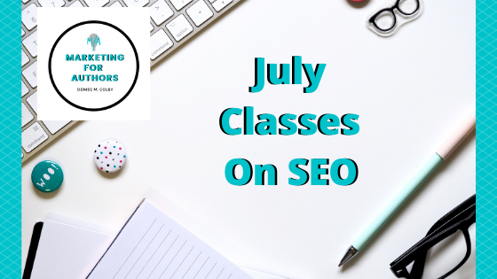 Clean white desk with words July Classes on SEO by Denise M. Colby