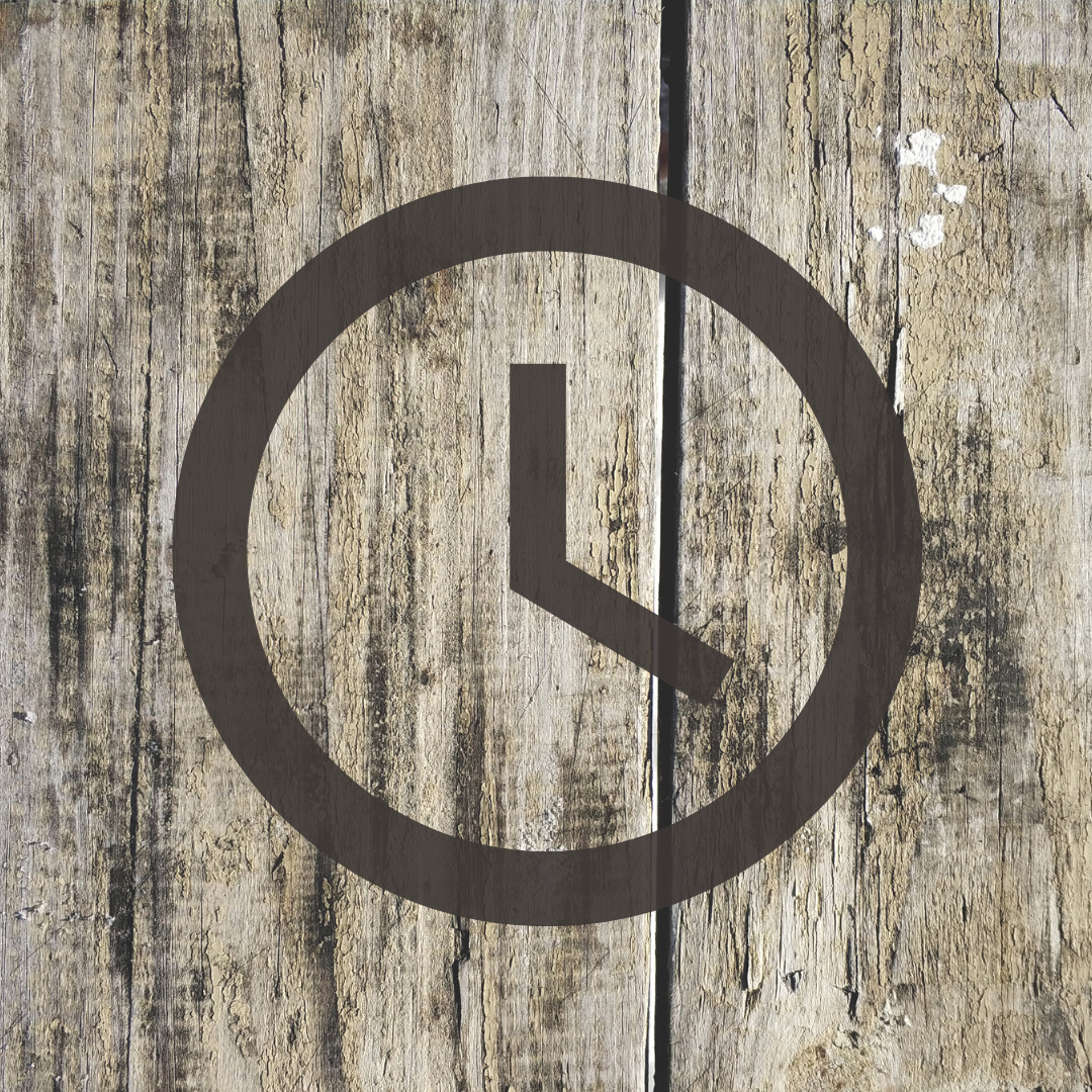 Simple clock on wood plank background, choosing the time you work to accomplish goals, matters