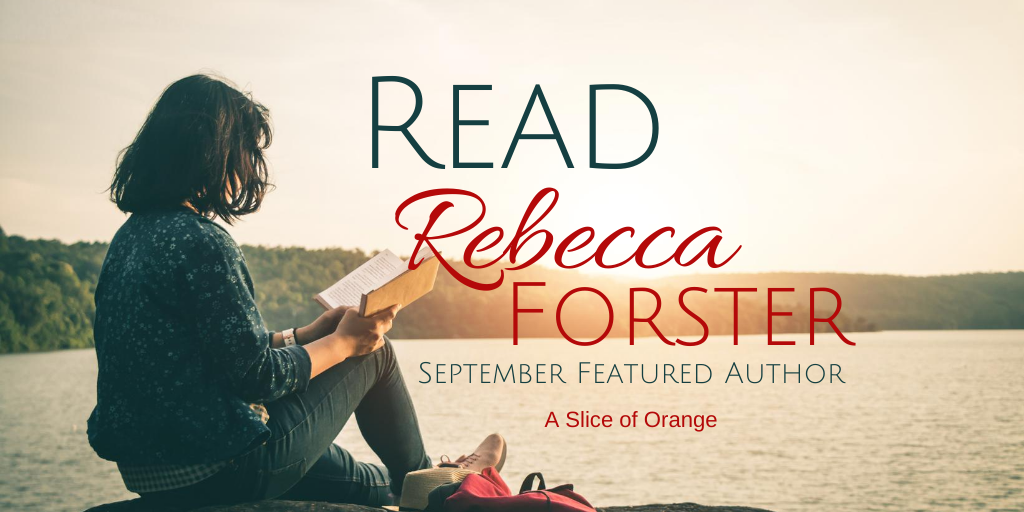 Picture of a woman reading a book by a body of water.