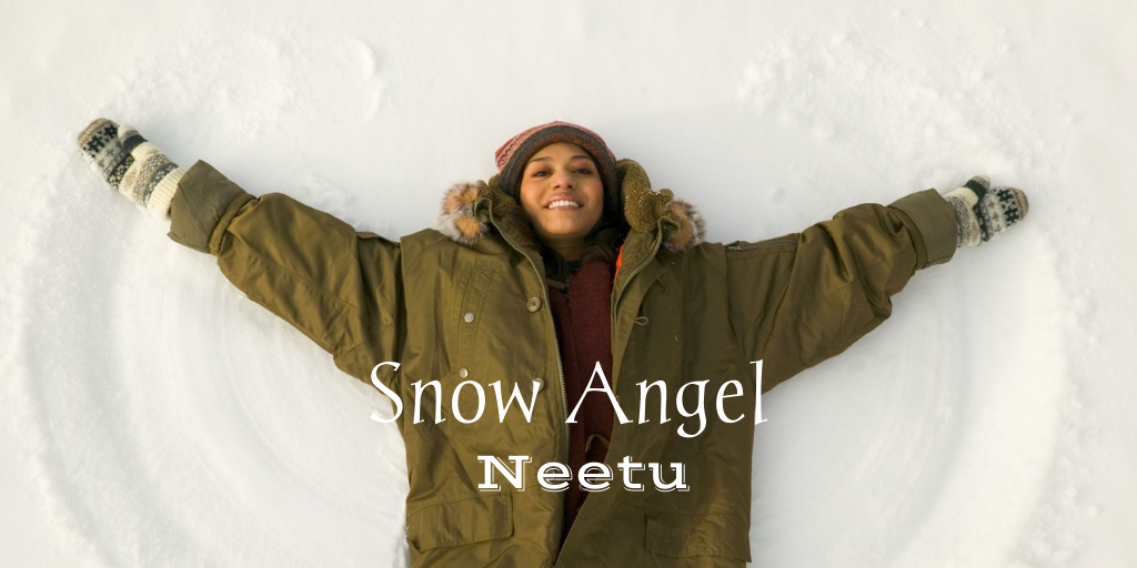 a woman making a snow angel
