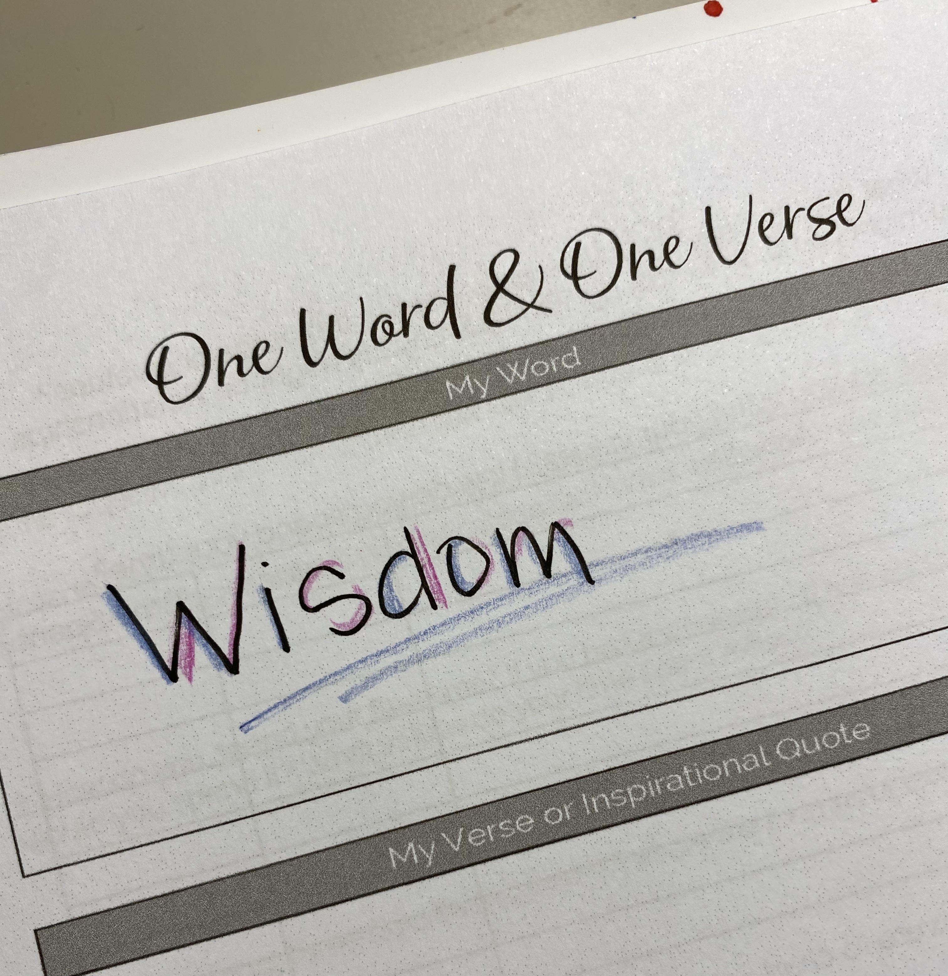 Denise M. Colby's Word of the year 2021 is Wisdom written out on a white piece of paper
