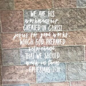 brick background with Ephesians 2:10 written out with focus word work in it by denise m. colby
