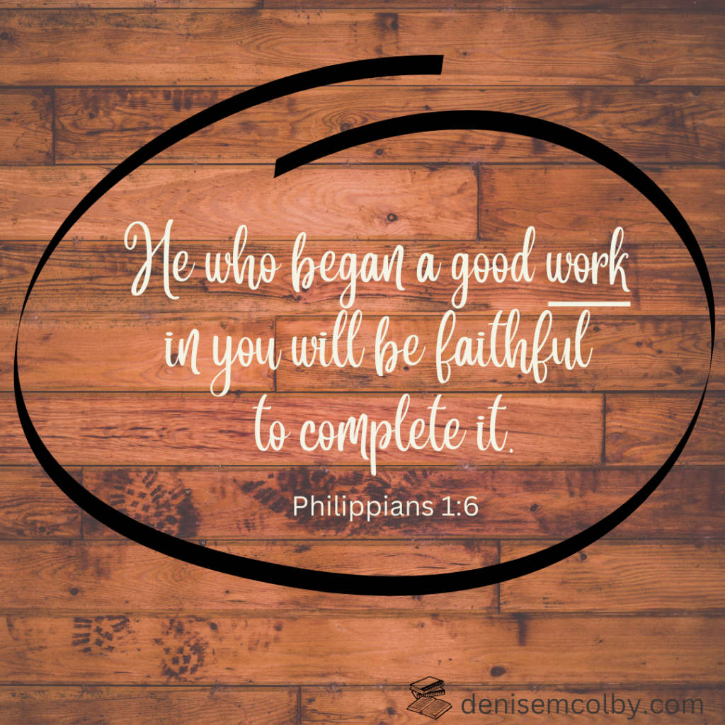 Wood background - with Philippians 1:6 written with focus word work in it by denise m. colby