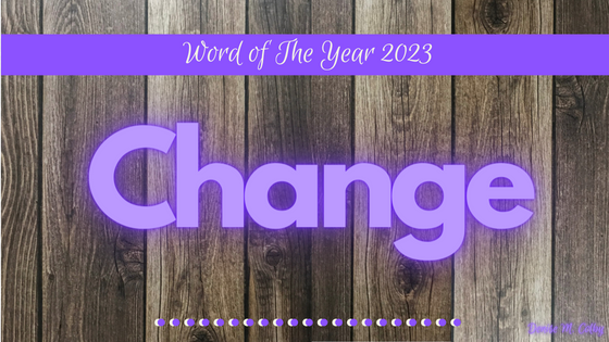 blog post titled word of the year 2023 is change written in purple on wooden looking background by Denise M. Colby