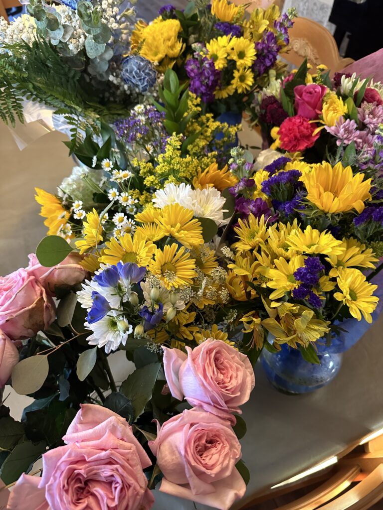 beautiful flower arrangements from debut novel book release party denise m. colby