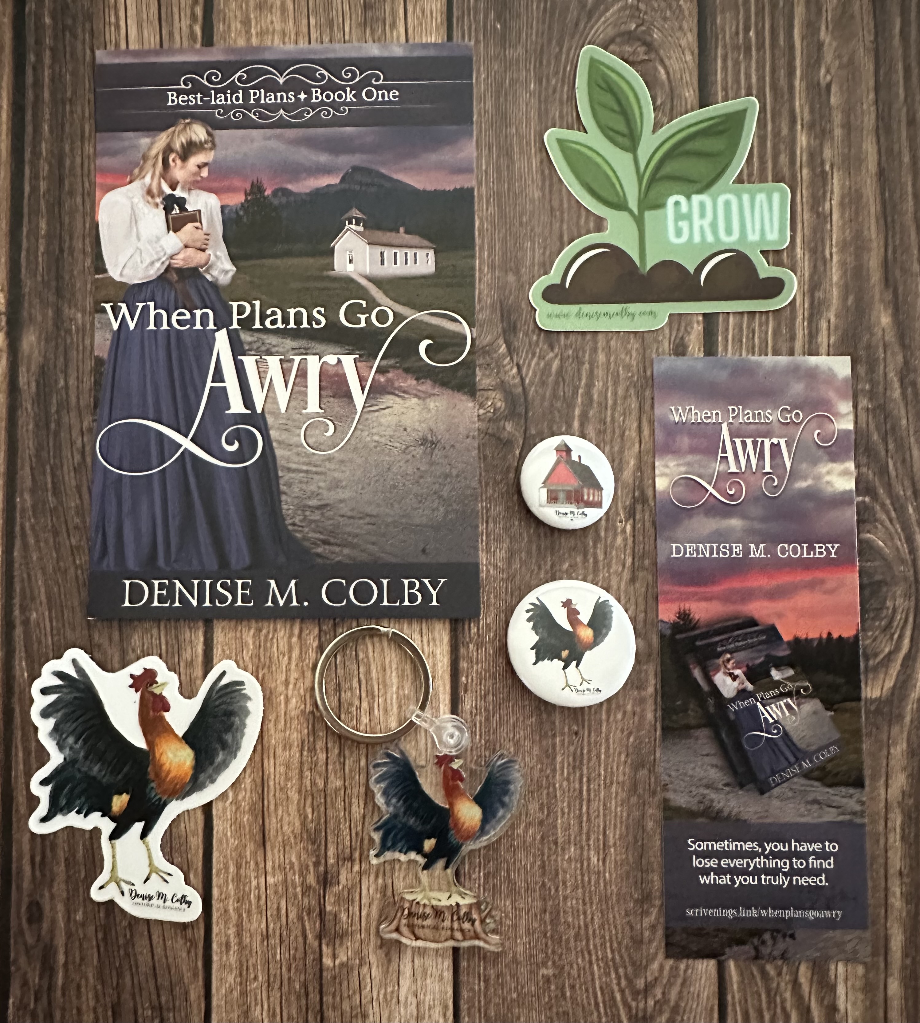 Denise M. Colby swag from her Best-laid plans series bert the rooster book one book two