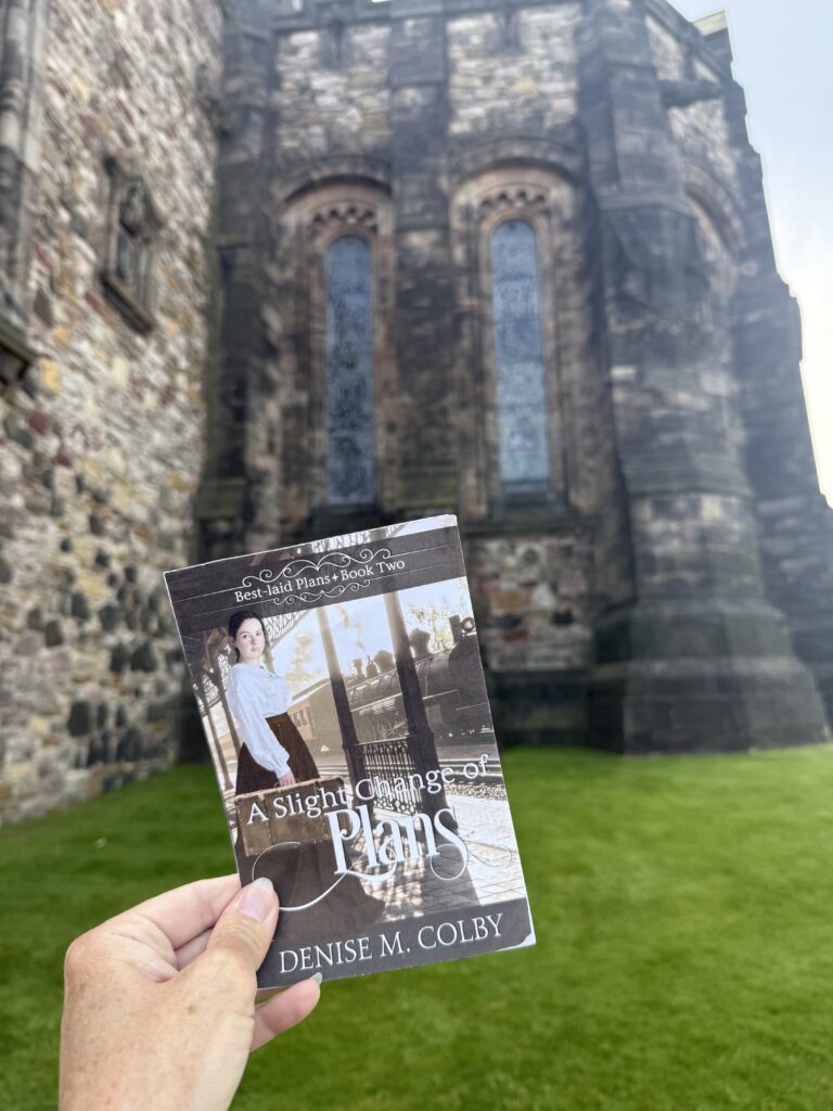 castle in background with book cover in front for book release announcement