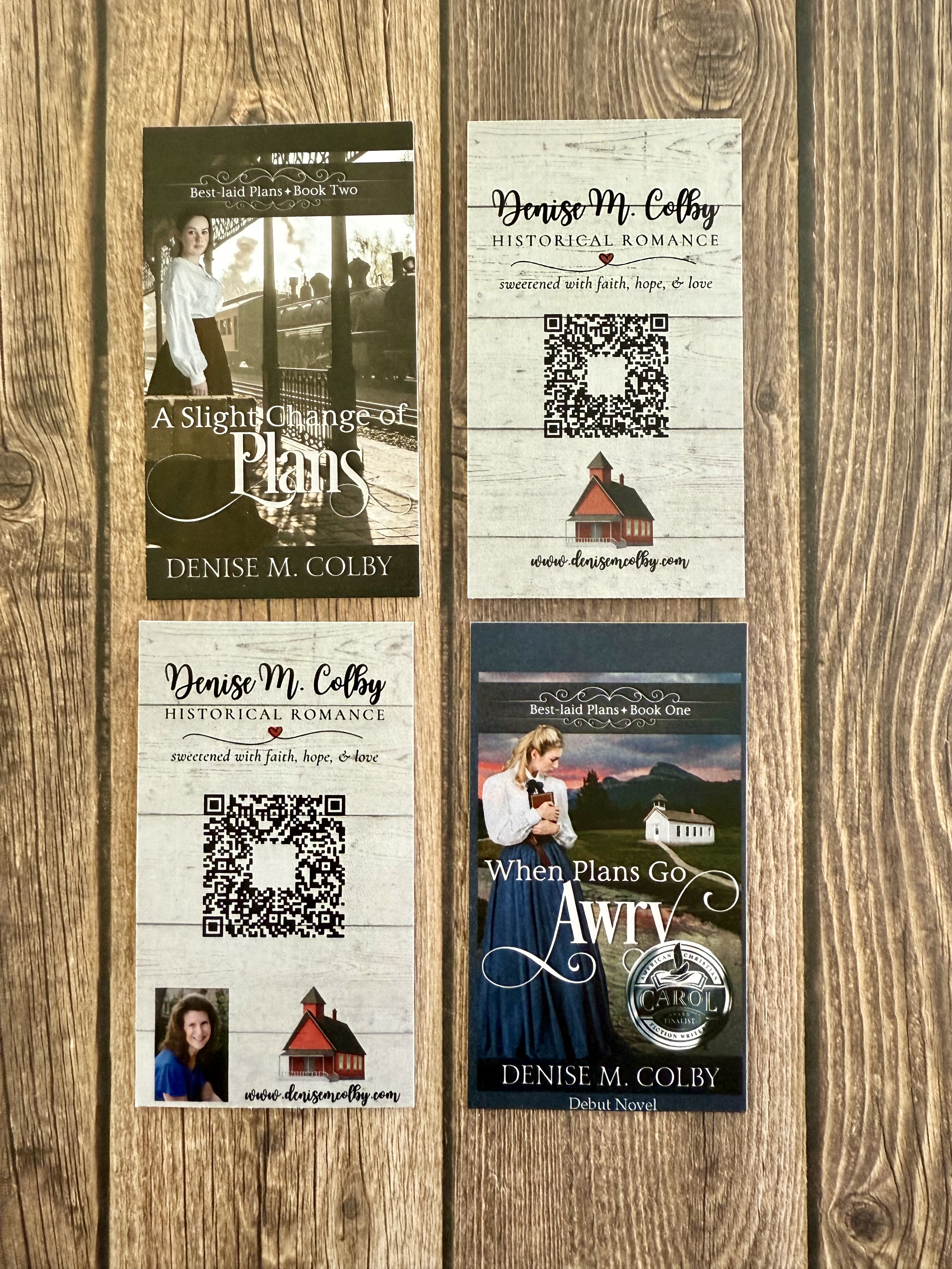 Denise M. Colby's business cards with her link tree QR code and book covers